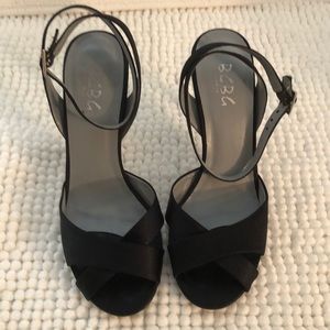 Black satin BCBG heels with ankle strap